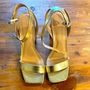Gold Madden Girl chunky heel shoes.
